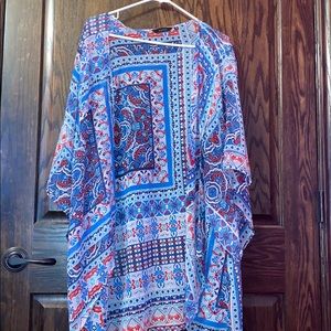 A patterned cardigan.